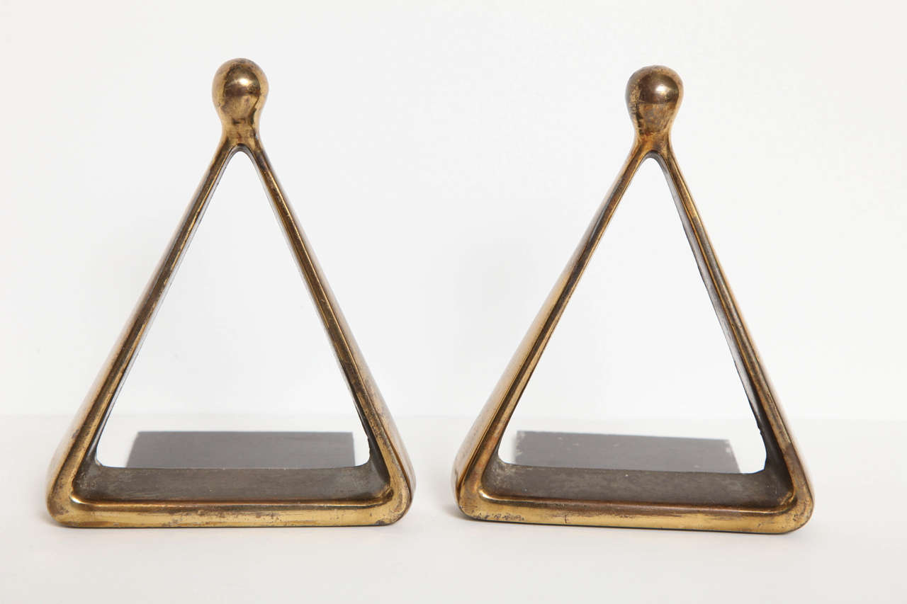 Set of triangle bookends in brass finish from the Jenfred-Ware series by Ben Seibel for Raymor.  USA, circa 1950.