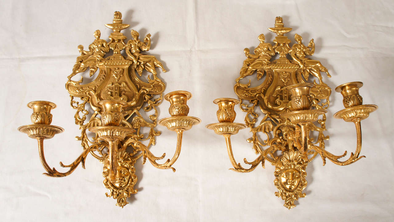 Pair of Dutch gilded bronze candle stick holders