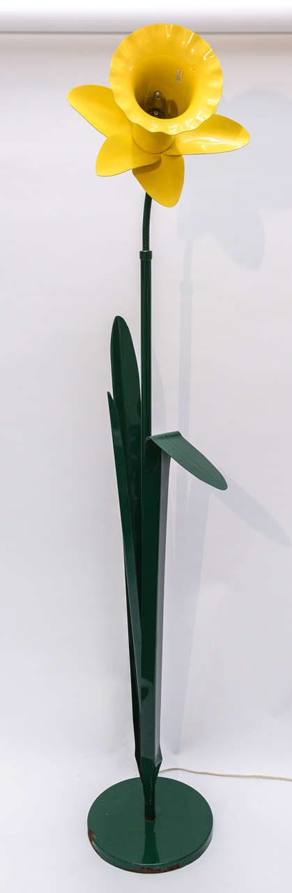 Spring will always be near with this stunning 1980's Daffodil floor lamp designed and manufactured by Bliss. Green enameled metal base and flexible stem with yellow enamel.This Pop Art Floor Lamp will make you smile and beautifully light up your