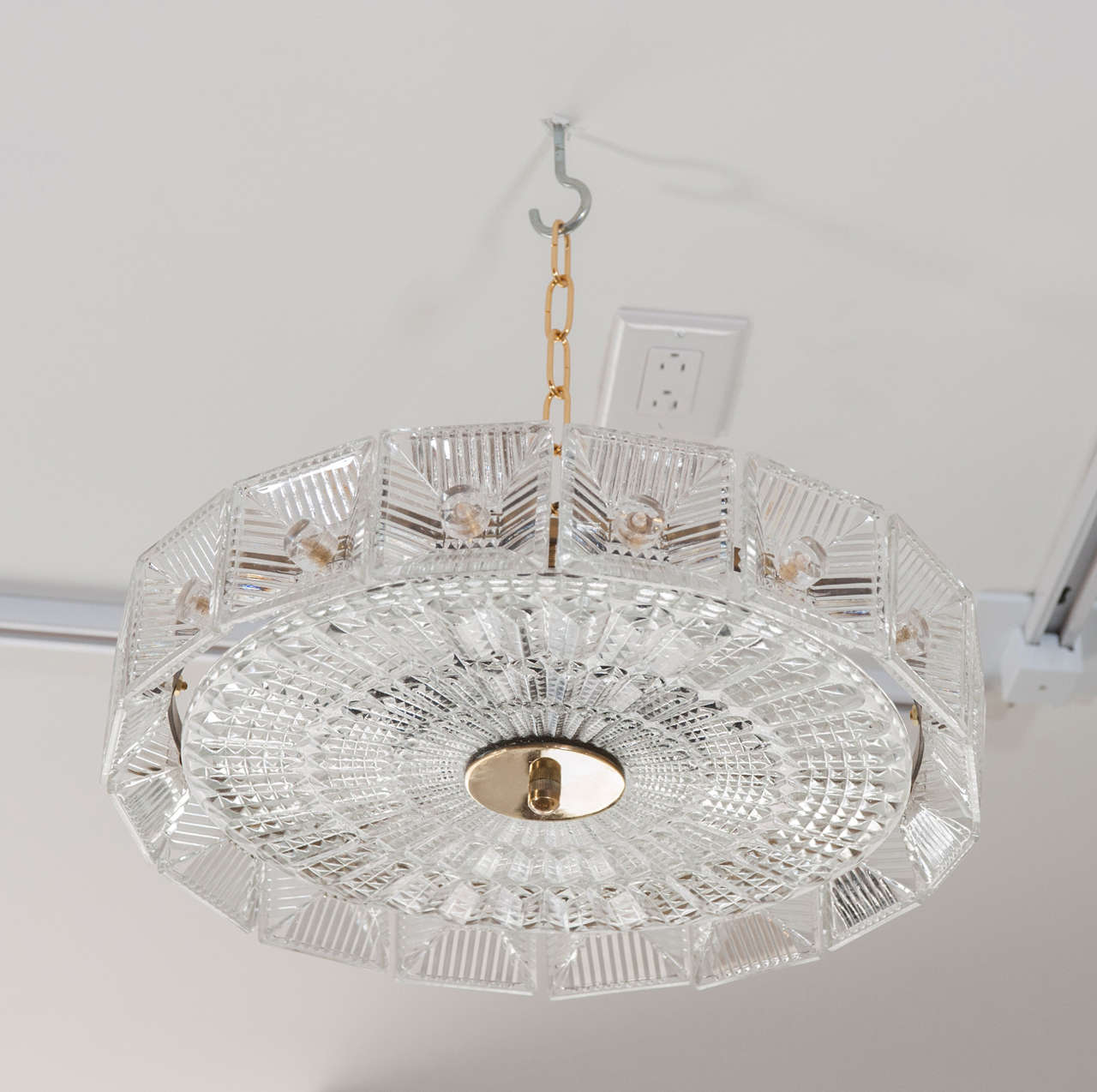 A fabulous and well designed six light flush mount light with moulded glass pieces affixed with lucite decorations.
Rewired for North America.