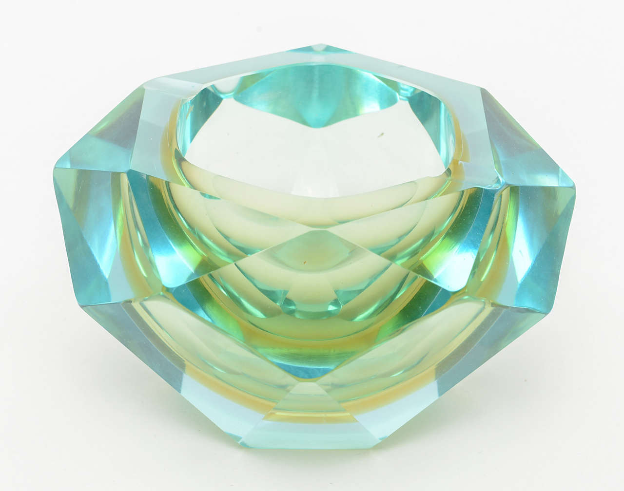 Faceted bowl in lightest of translucent colors.