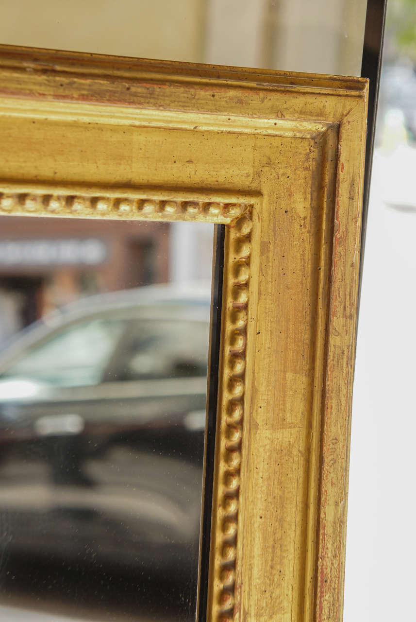 Fine Pair of Vintage Carved and Gilded Wood Louis XVI Style Pier Mirrors In Excellent Condition In Hudson, NY