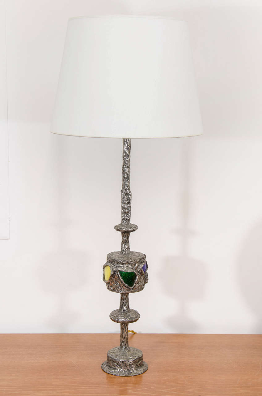 Metal and multicolored glass table lamp by artist Raymond Trameau. Handcrafted by the artist and signed.