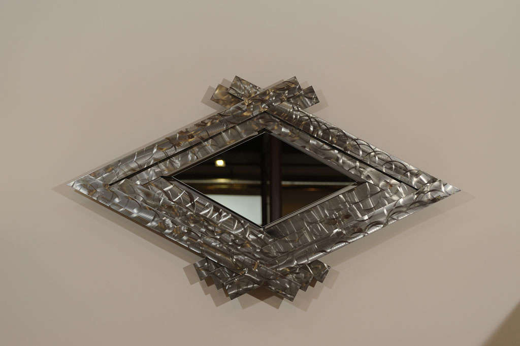 Chevron shape steel mirror by C. Jere