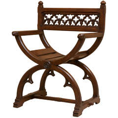 An English Gothic Revival Oak Glastonbury Armchair, Circa 1830