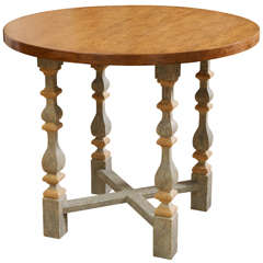 A Baroque Style Mahogany and Painted Center Table