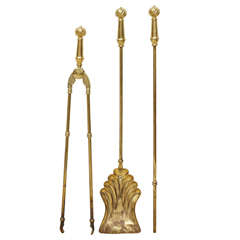 Antique A Victorian three piece set of brass fire irons