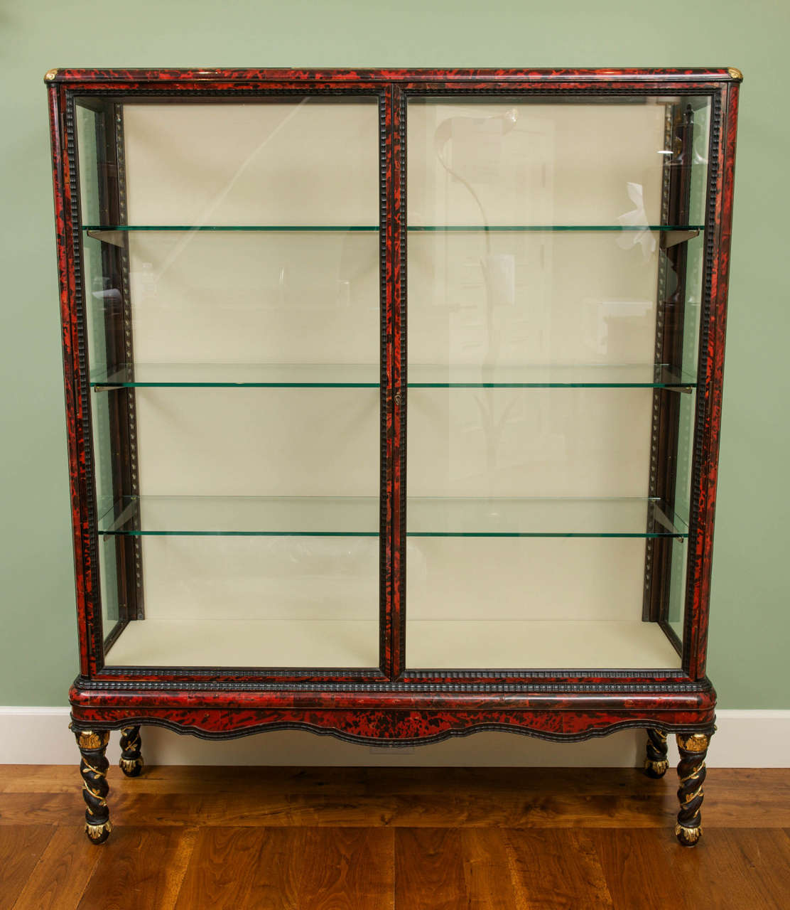 A French Red Tortoiseshell and Ebony Display Cabinet