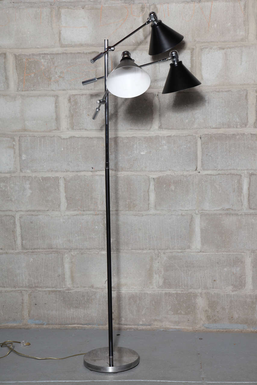 Fabulous adjustable lamp influenced  by Arredoluce lamps of the early 50's and 60's.  Height adjustable to 63
