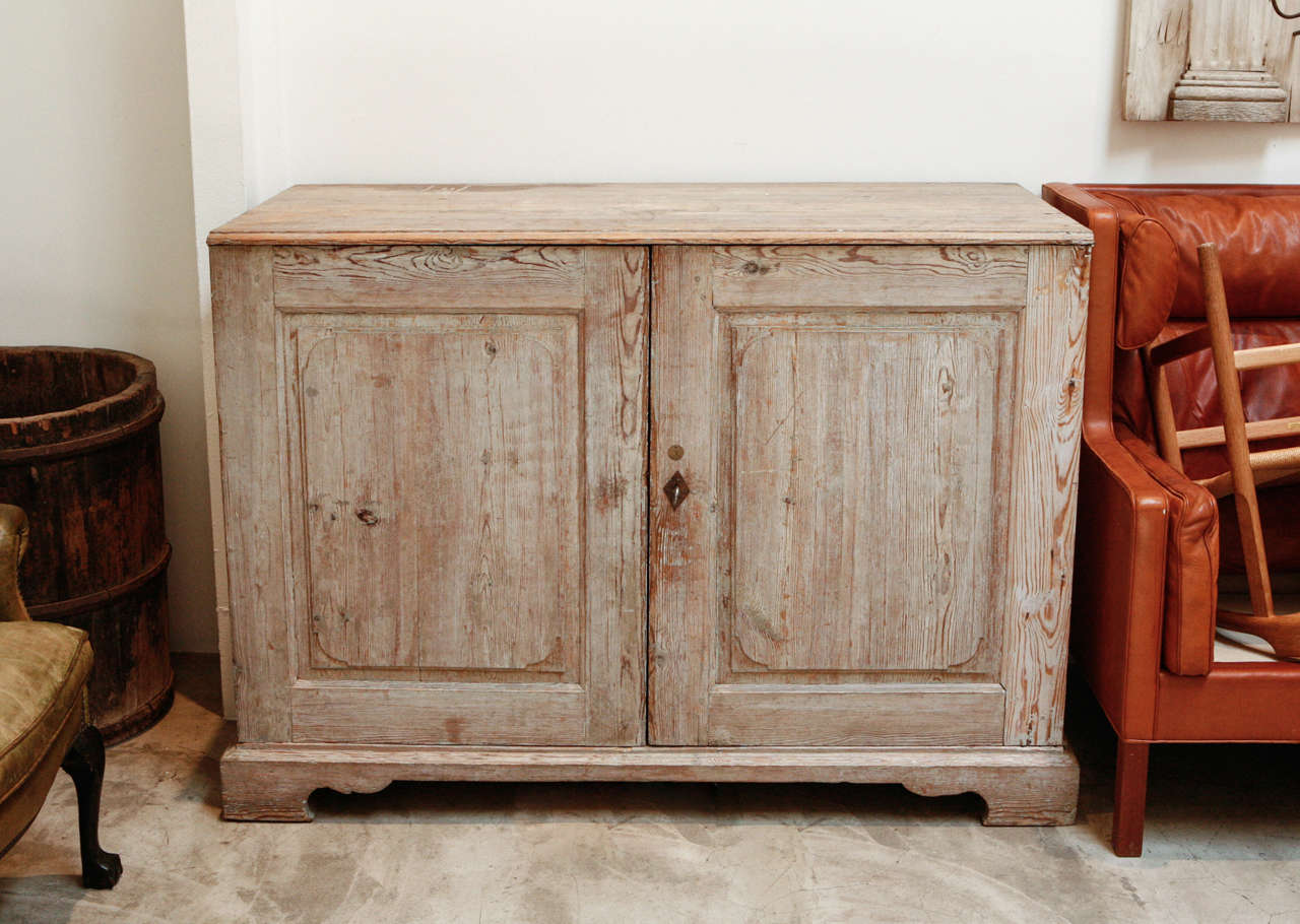 a huge chest from sweden with 5 shelves that seamlessly pull in & out. original key included.