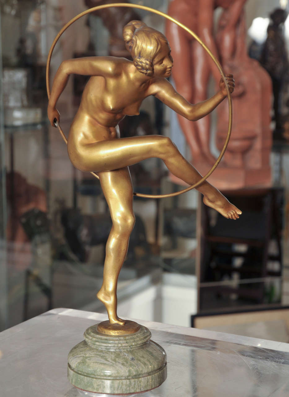 1930s Art Deco gilded patina bronze statuette of a 