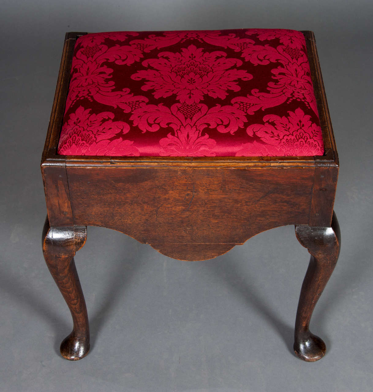 British Mid-18th Century Oak Dressing Stool with red damask covered drop-in seat