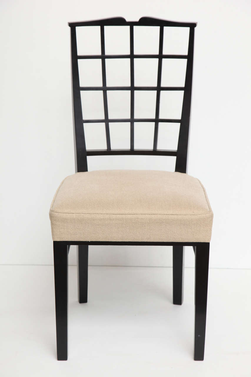 A set of eight dining chairs in ebonized fruitwood by Dominique (André Domin and Marcel Genevrière)

These chairs were originally designed by Dominique for the Pavillon de l'architecture of the Exposition Internationale des arts et techniques,