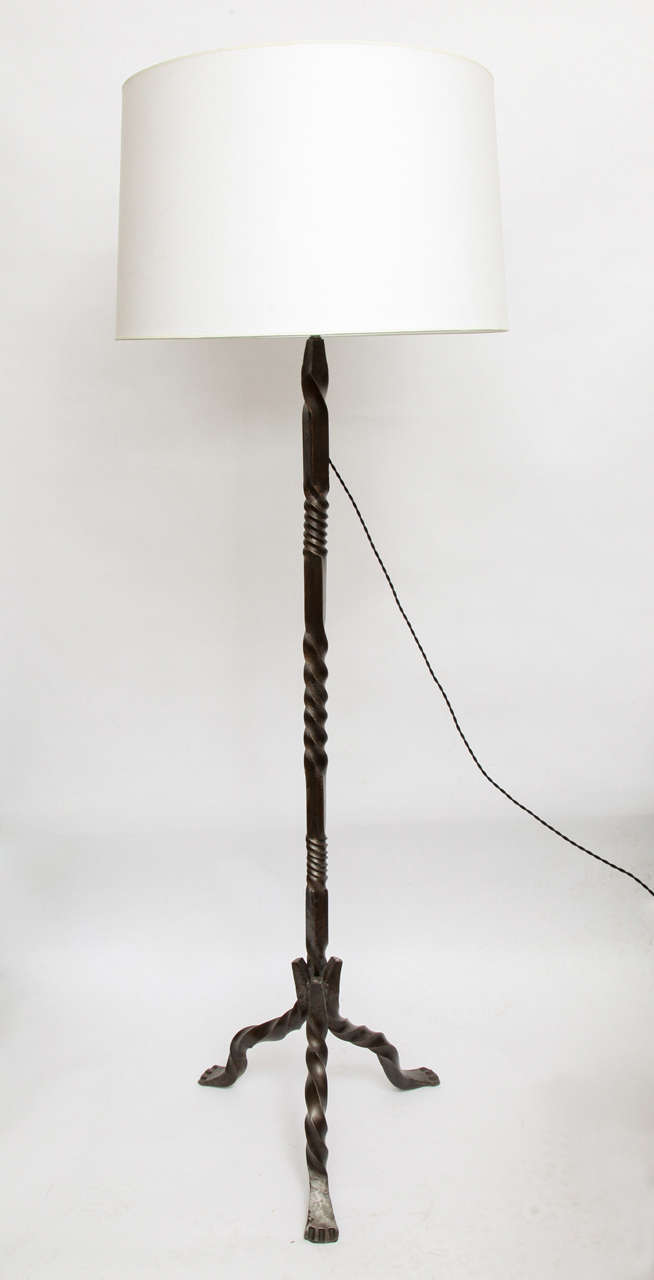 A 1920s French Art Deco hand-wrought iron floor lamp.
Shade not included