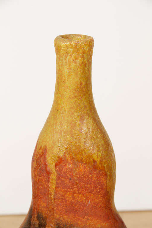 Great gourd form vase with textural finish and beautiful dripping glaze. Signed on underside.