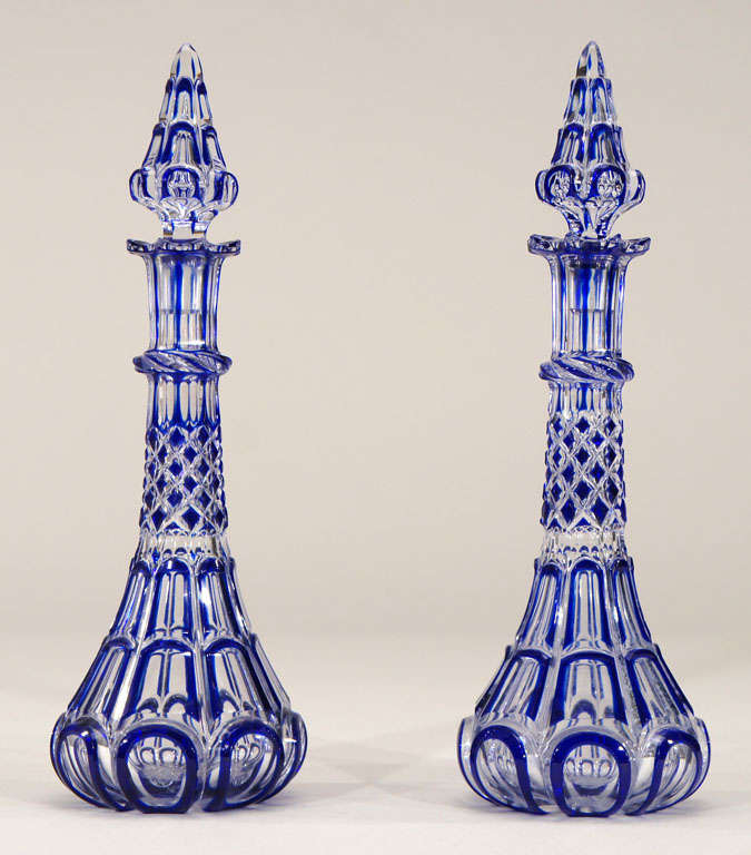 A pair of masterfully cut to clear crystal decanters, made in England from the Midlands, circa 1845 as described and pictured in Chas. Hadjamach's book, 