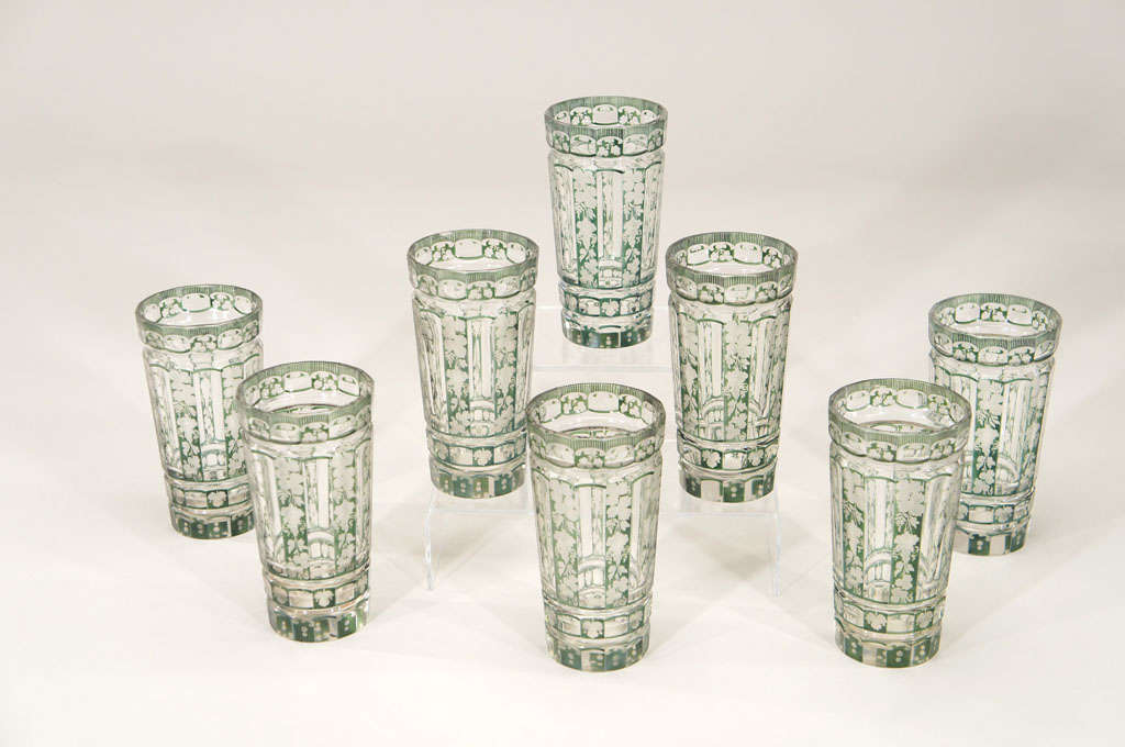 These hand blown crystal tumblers are extremely heavy and solid with complex panel cutting on the sides, rims and bases. Each with dark green overlay and cut to clear in a 