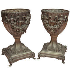 Pair of Large Silvered Metal Urns