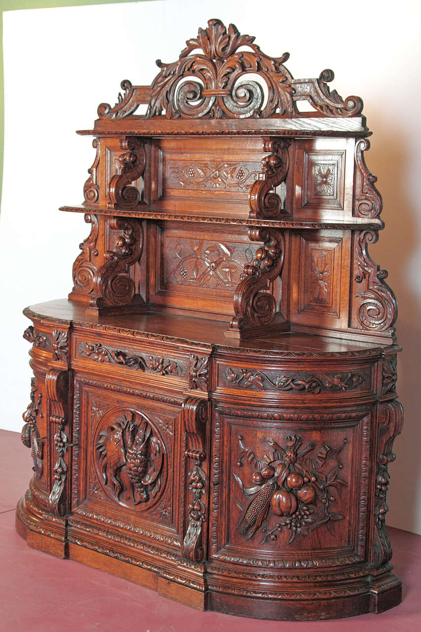 Exquisite oak hunting buffet cabinet, circa 1860. Beautifully carved and rich patina. A must for a hunting lodge, a Texas ranch, or an elegant study!