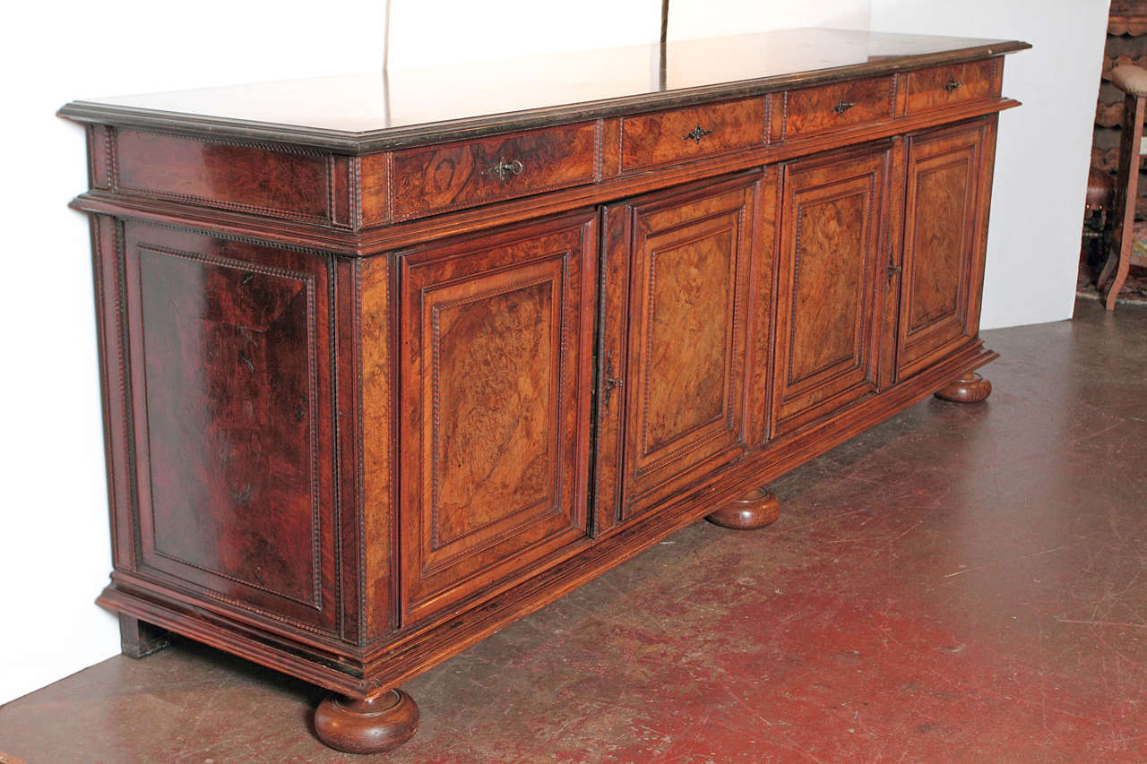 Elegant early 19th century buffet enfilade with marble in burl walnut. It has the original marble. (c:1830). Exquisite patina with wonderful storage!