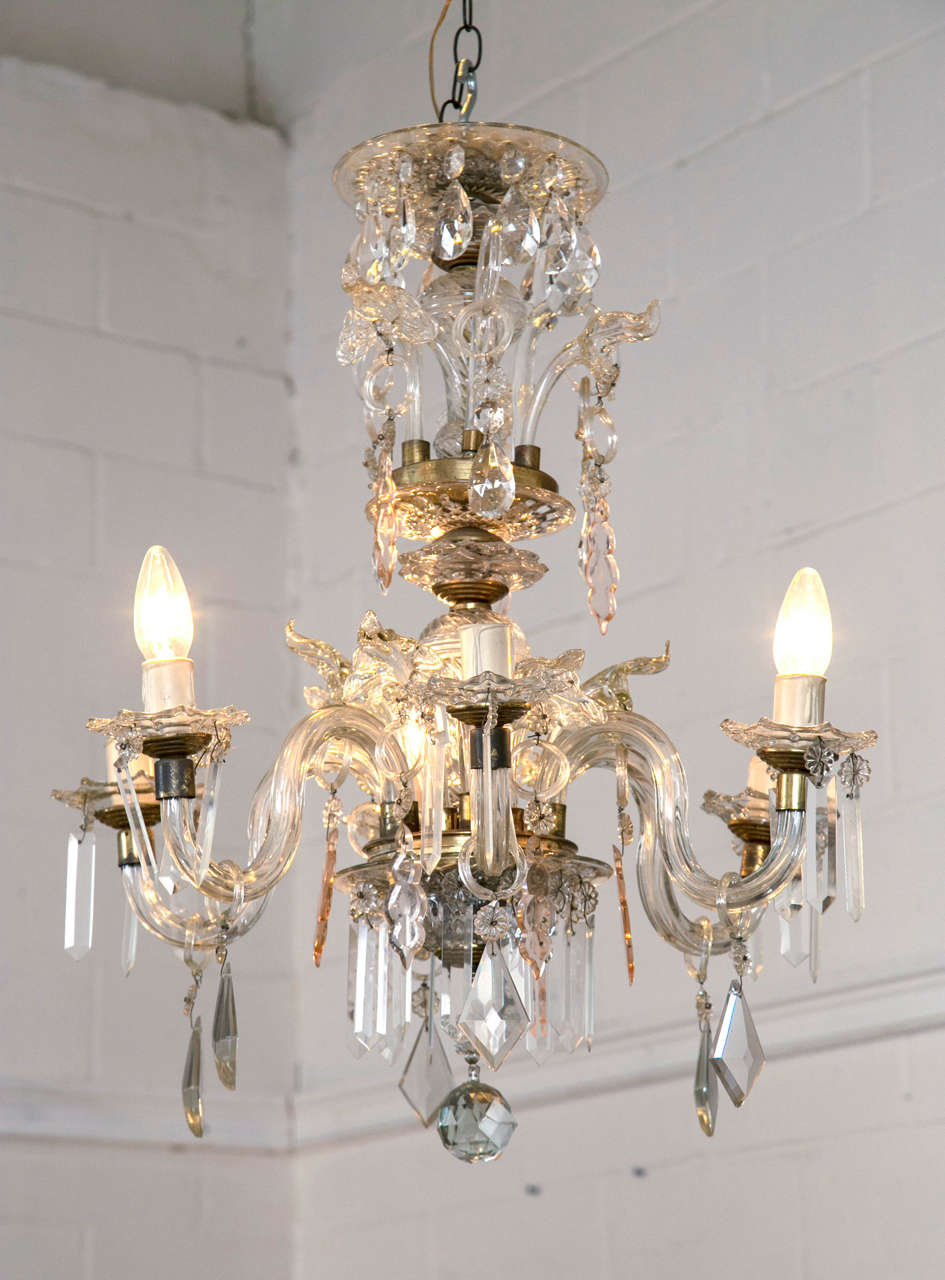 Venetian crystal chandelier with large crystals, vintage, 1900s, Argentina. Beautiful shimmering crystals with a touch of soft amber/rose to add a pop of soft color. This piece is reminiscent of the roaring 1920s. This six-light chandelier has