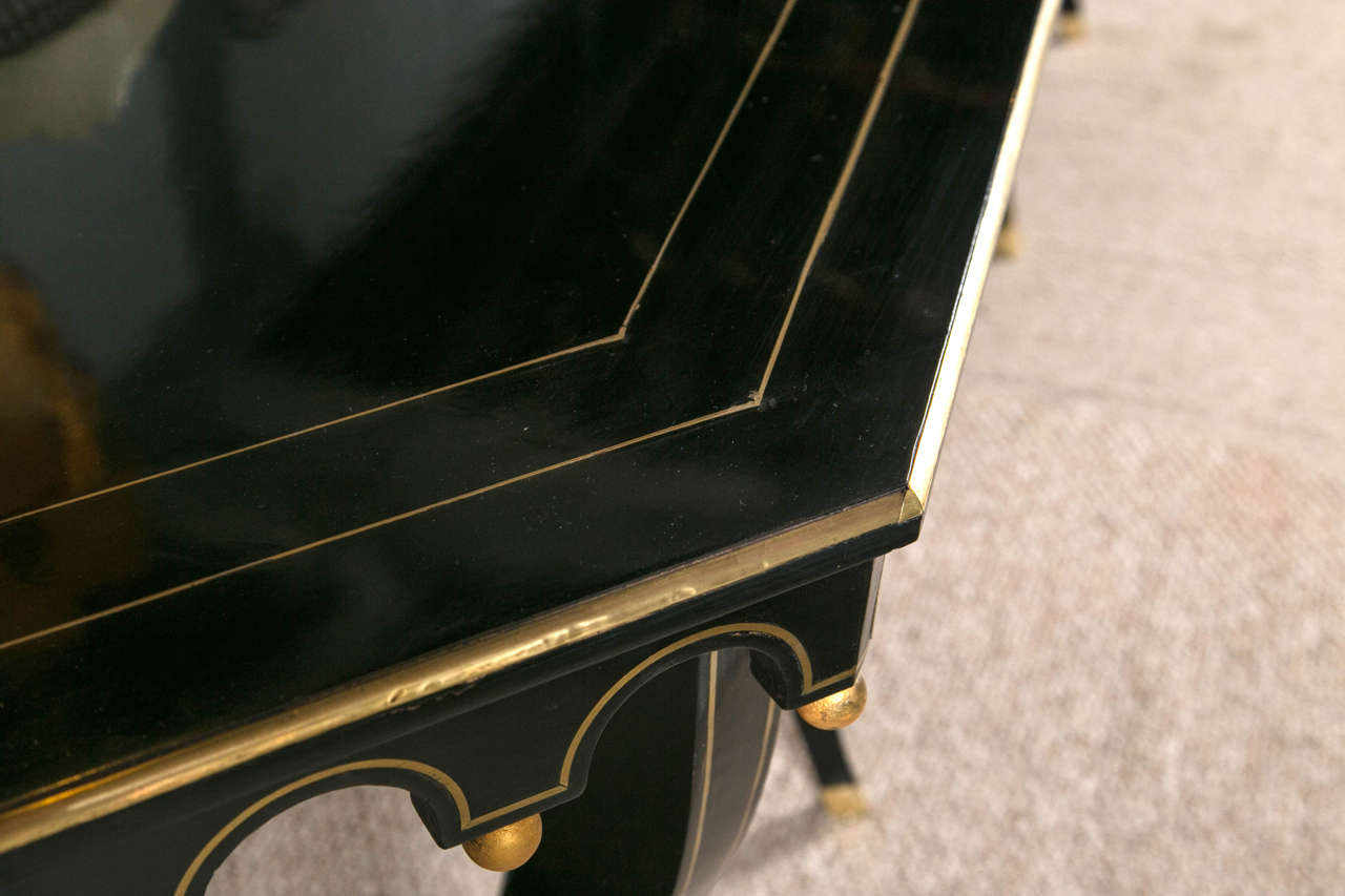 French Pair of Ebonized and Gilt Decorated Console Tables By Maison Jansen