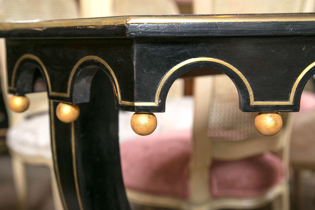 Pair of Ebonized and Gilt Decorated Console Tables By Maison Jansen In Good Condition In Manhasset, NY