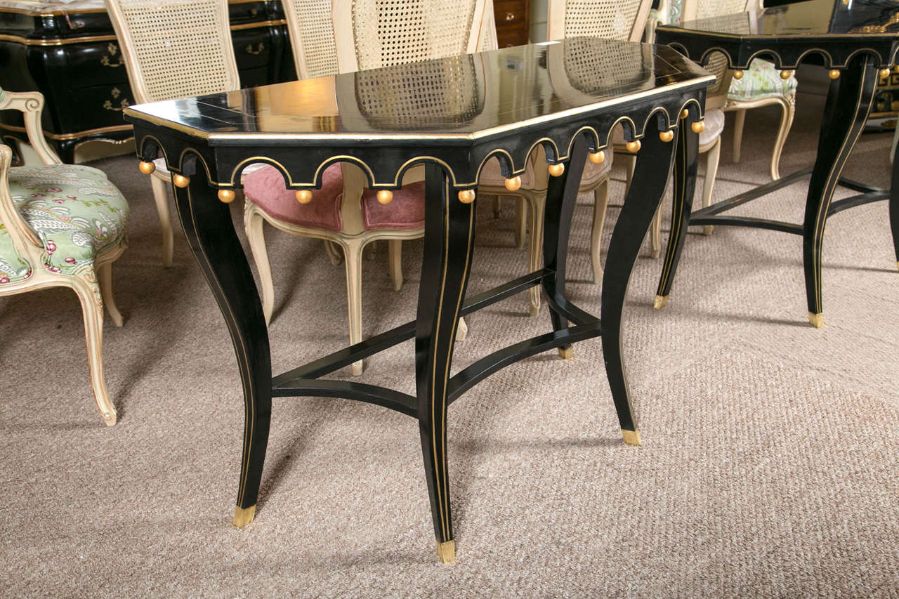 Pair of Ebonized and Gilt Decorated Console Tables By Maison Jansen 1