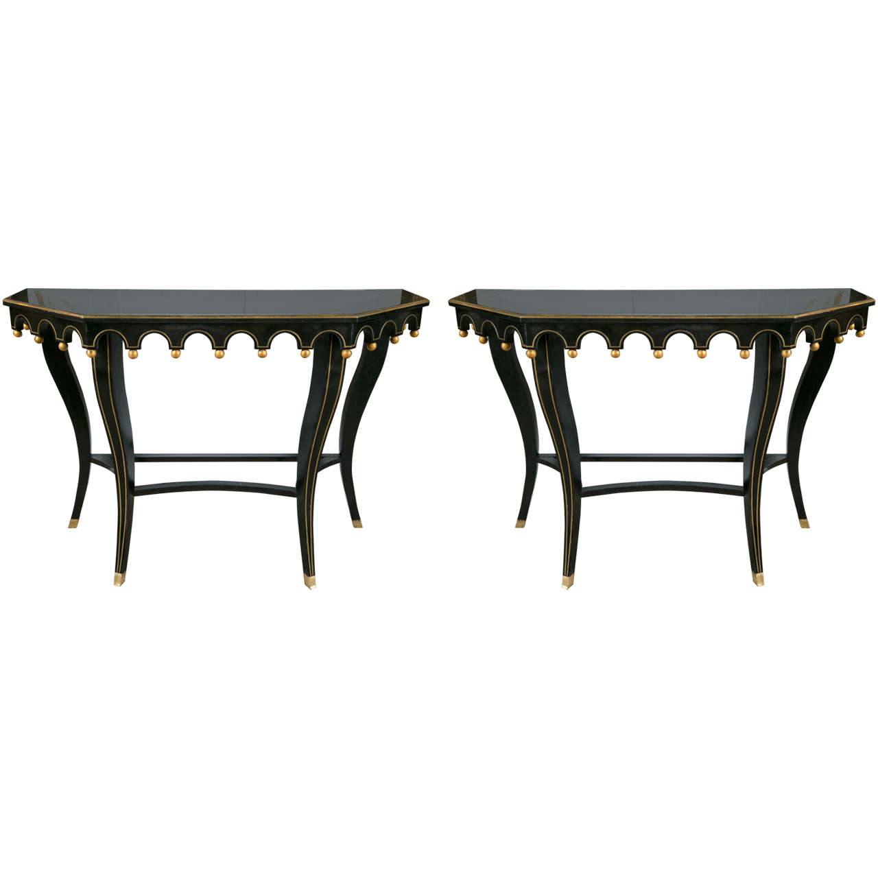 Pair of Ebonized and Gilt Decorated Console Tables By Maison Jansen