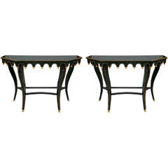 Vintage Pair of Ebonized and Gilt Decorated Console Tables By Maison Jansen