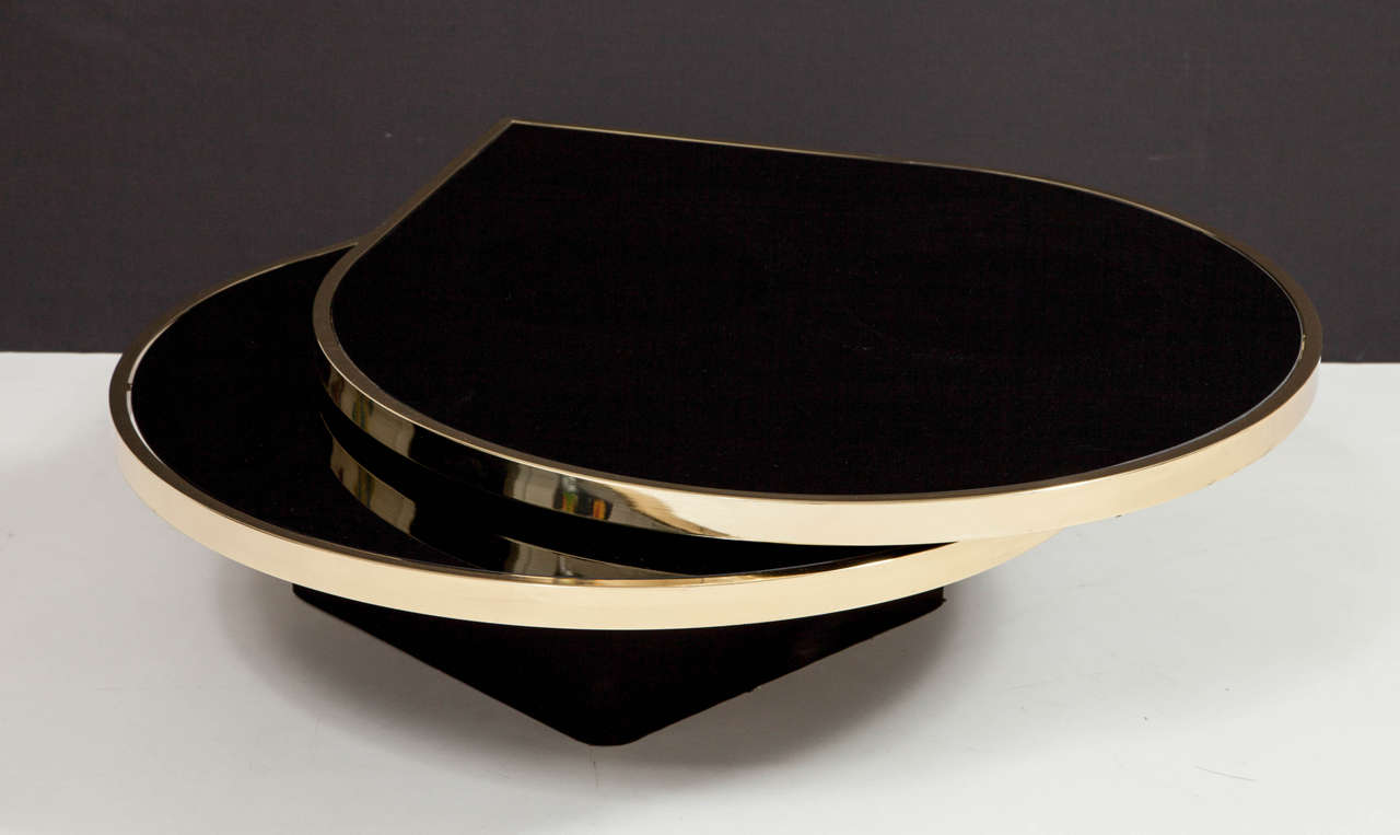 Black Glass and Brass Teardrop Swivel Cocktail Table by DIA, Signed In Excellent Condition In New York, NY