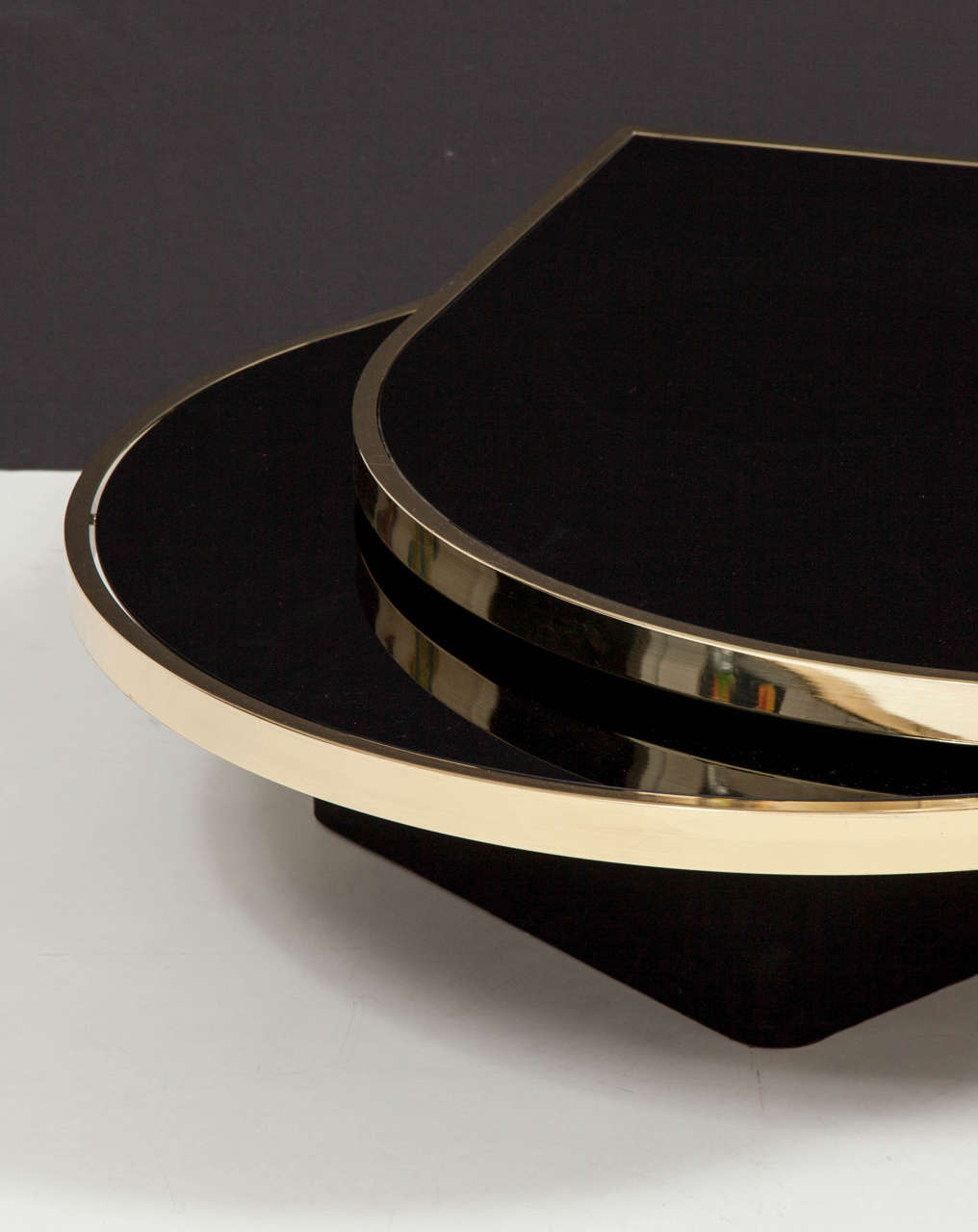 20th Century Black Glass and Brass Teardrop Swivel Cocktail Table by DIA, Signed