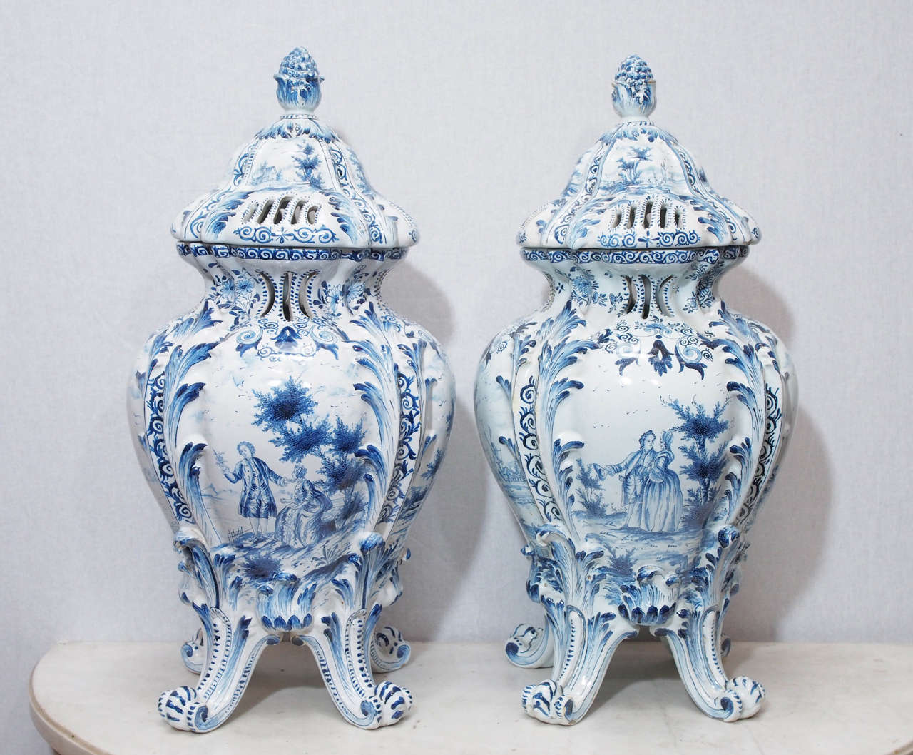 Set of four blue and white Delft Parfumiere all on raised feet with pierced lids for which the scent was diffused.
19th c.