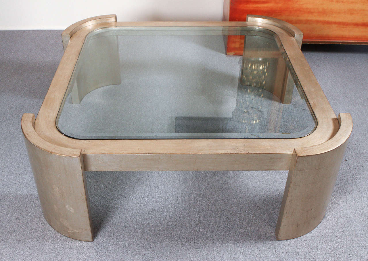 Large coffee table with a beautiful glazed silver leaf finish and inset glass top.