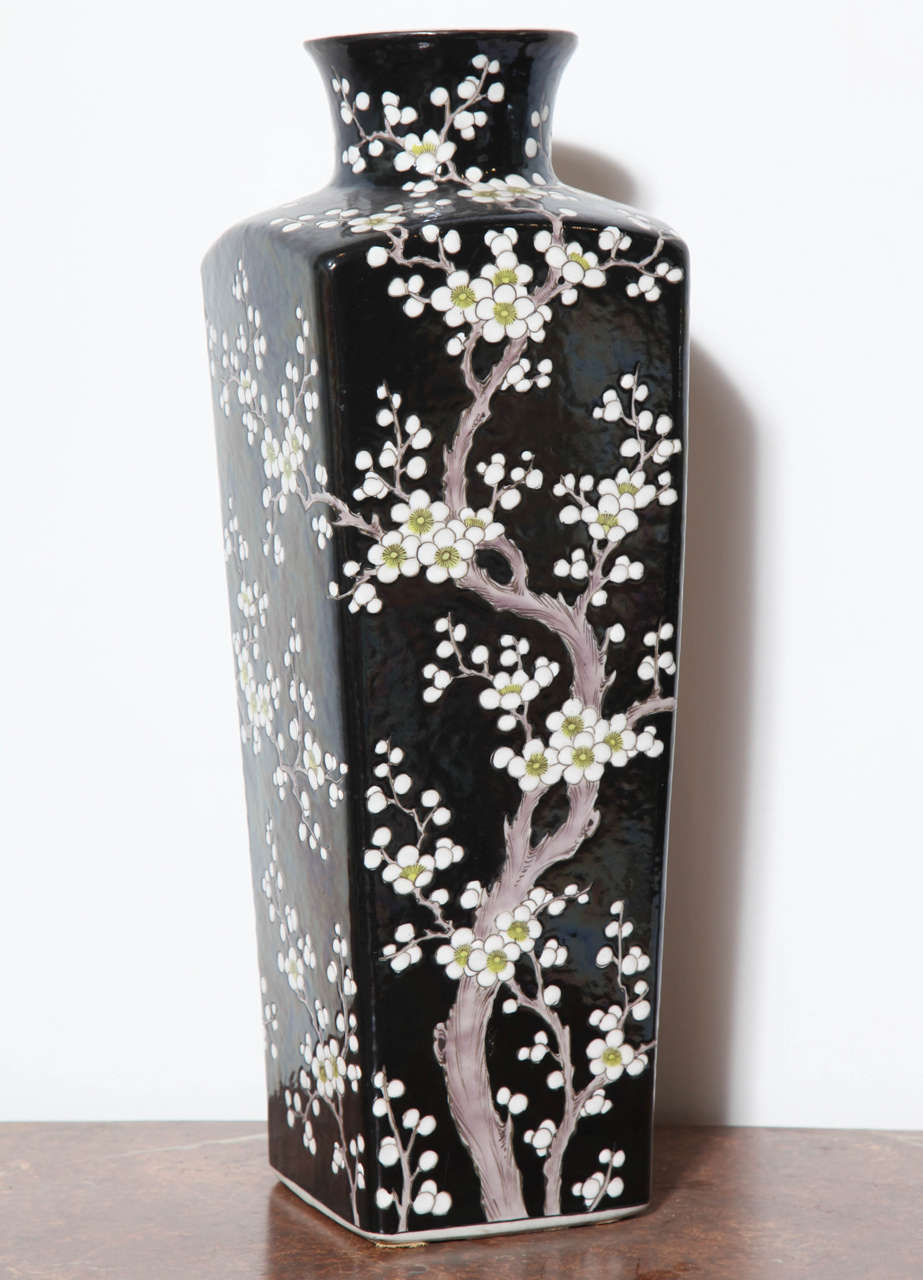 A Black Glazed Chinese Vase with White Cherry Blossom Motif