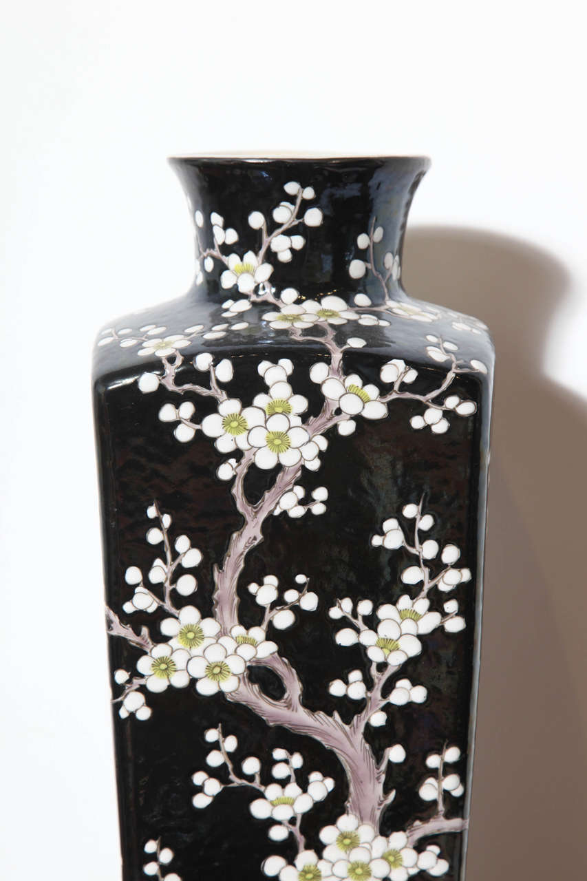 20th Century Black Glazed Chinese Vase with White Cherry Blossom Motif For Sale
