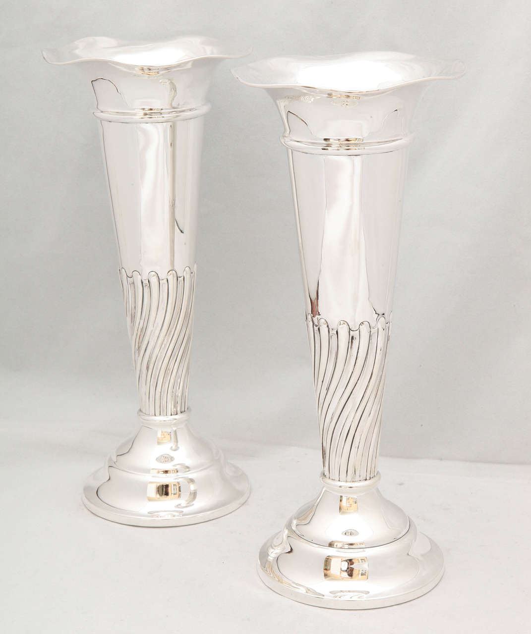 Edwardian pair of sterling silver vases, Birmingham, England, 1909, Wm. Hutton & Sons - makers. Each is 10