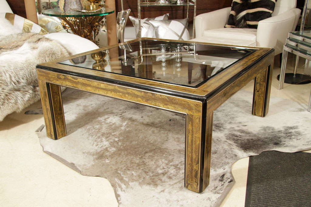 Coffee table by Bernard Rohne for Mastercraft. The table has hand burnished and acid etched brass design.