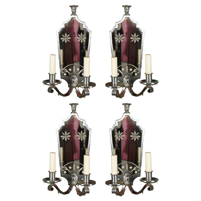 Four Nickel and Mirror Sconces For Sale