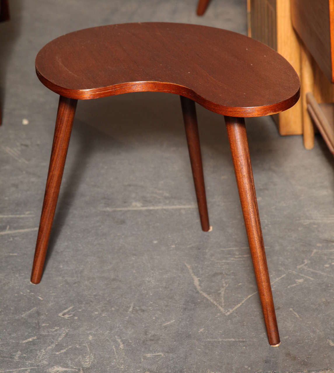 Vintage 1950s Danish Modern Teak Side Table.

This Atomic Table is in beautiful condition, so sculptural that you could just place it in a room without putting anything on top and it stands alone as a piece of art. Great in the living room to