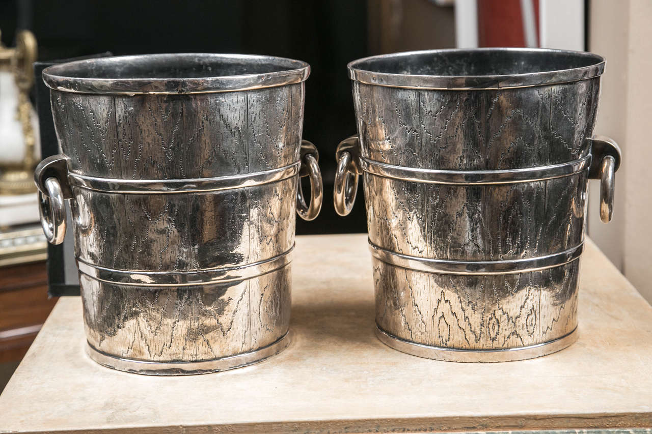 A fine pair of silver plated ice buckets
by the Manhattan Silver Co. of Lyons, NY, circa 1850. Both pieces are stamped and numbered on base.
 
Provenance: Private prestigious Southern collection.
