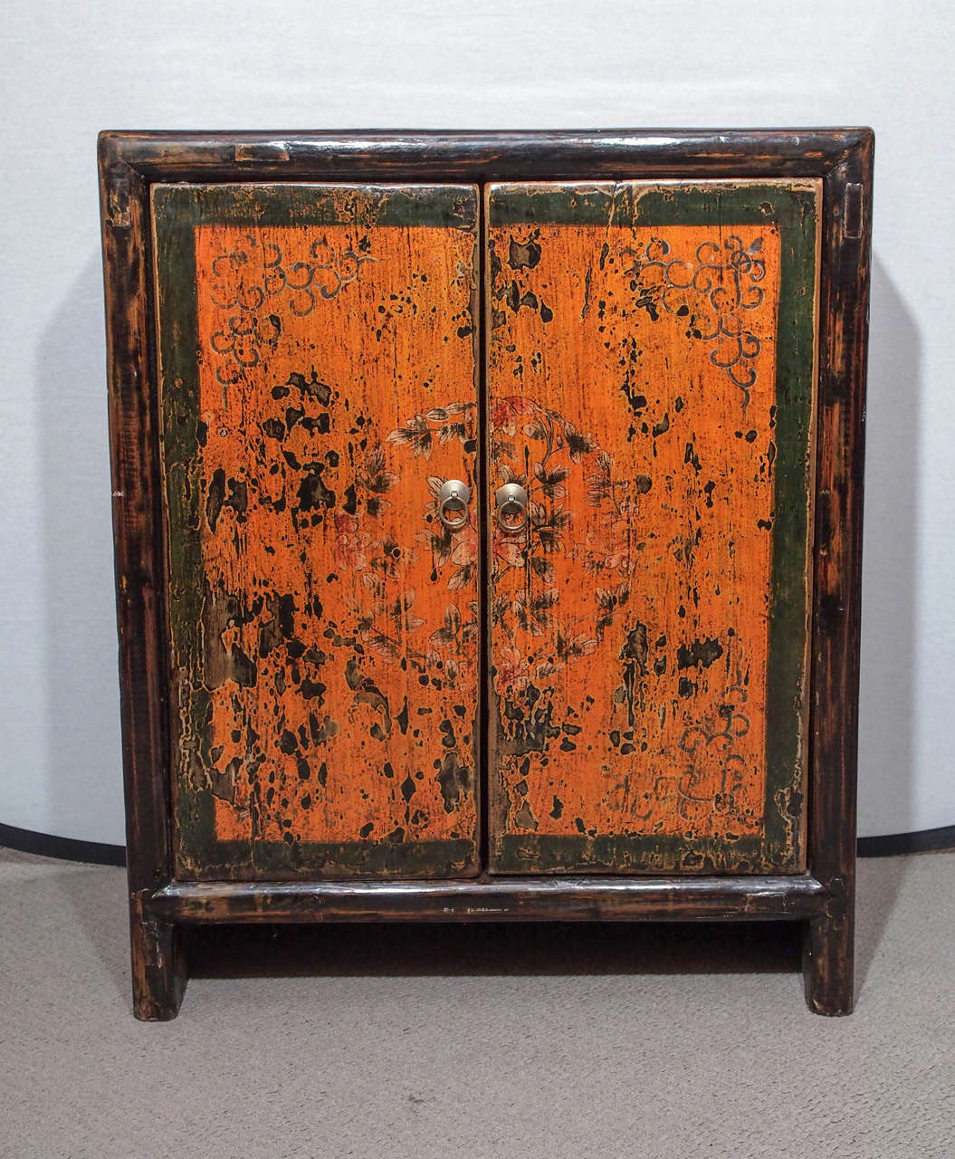 Antique Chinese painted black lacquer cabinet