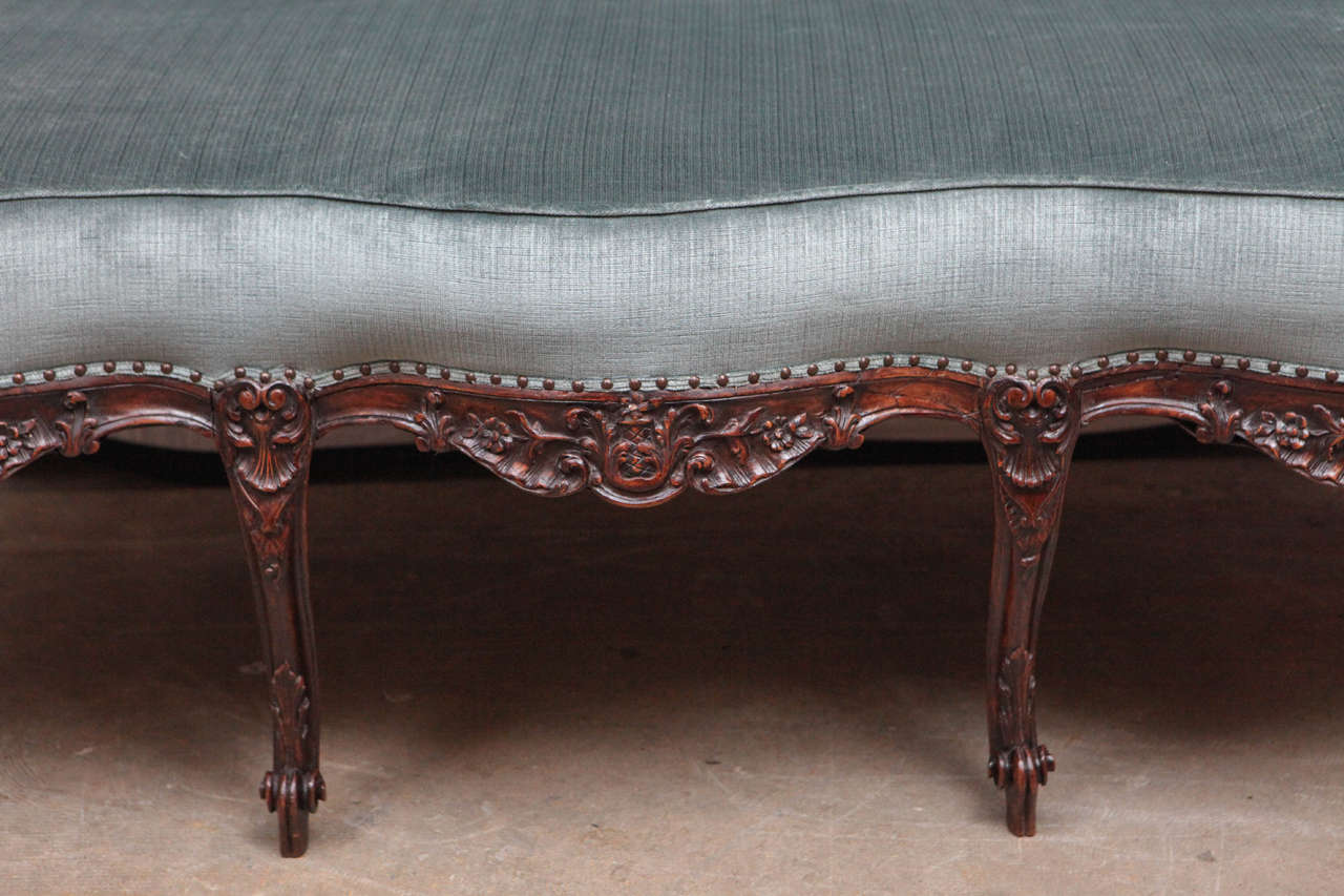 Carved 19th Century French Walnut Armless Settee