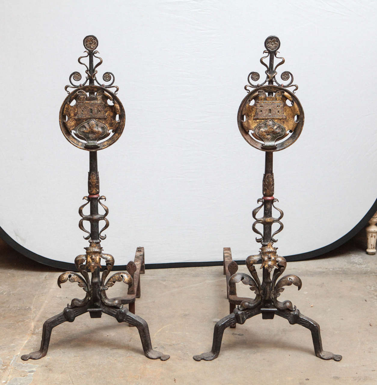 Pair of very fine large 1900s Italian style polychromed iron chenets with face detail. The chenets are signed.