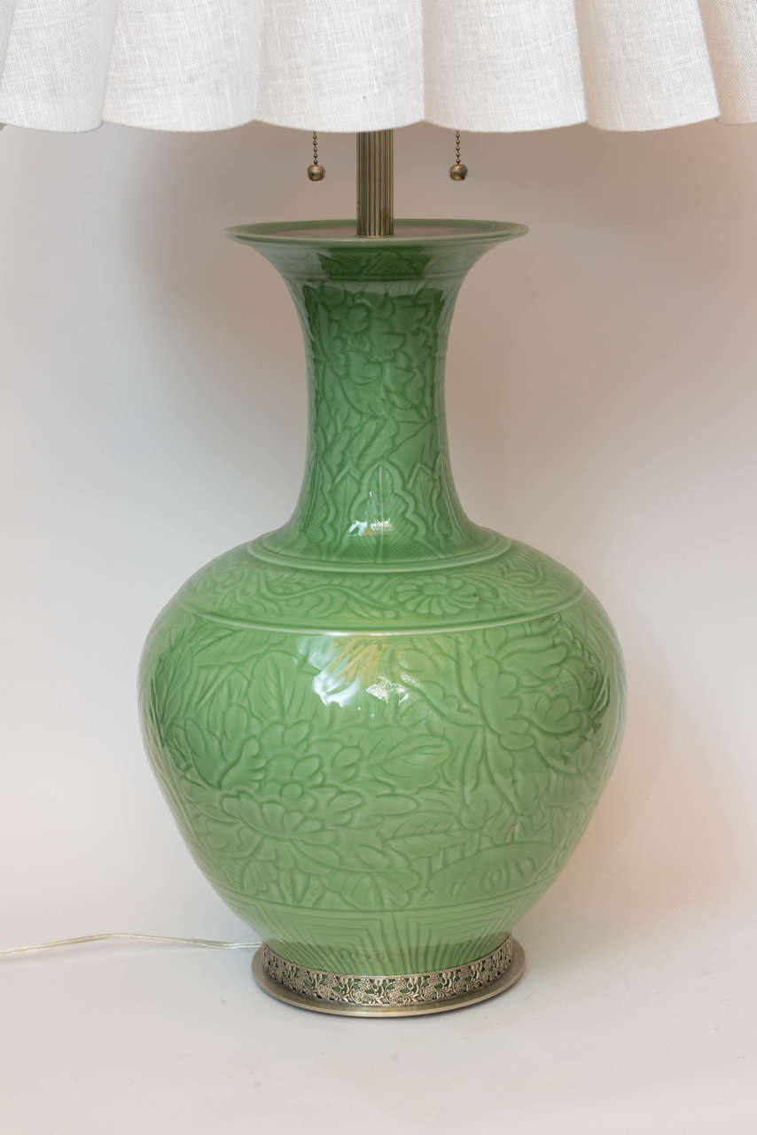 Pair of Chinese Porcelain Engraved Green Jade Colored Lamps In Excellent Condition For Sale In Palm Beach, FL
