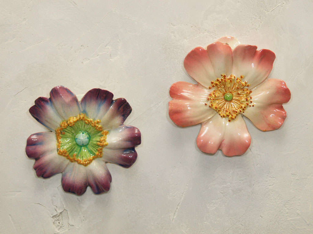 Colorful and decorative French majolica flowers, made in the South of France in the Vallauris area by the Massier family and Pierre Perret.  Marked. Sold separately.