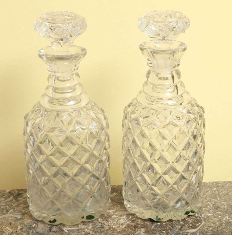 Fine pair of Regency diamond and hobnail cut crystal decanters, English, circa 1820-1830.