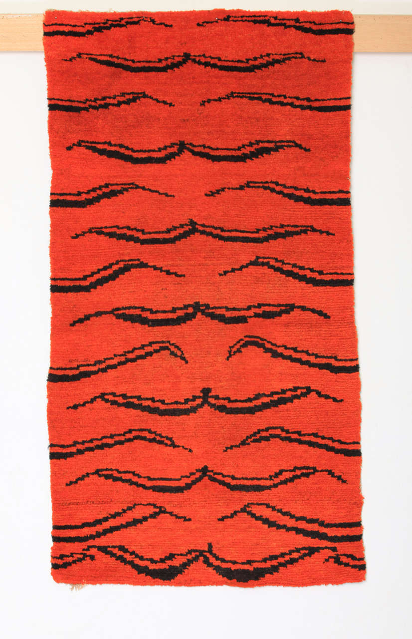 The tiger pelt was a symbol of high rank in Tibet, employed almost exclusively on weavings which belonged to the religious as well as secular upper class. Following a series of important exhibitions and publications, rugs with this design have