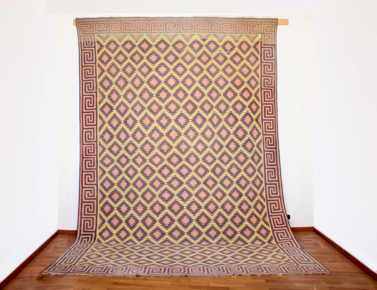 A rare example in a palace size woven on a lemon yellow background. Dhurries of these dimensions were often commissioned to adorn the grandiose rooms of the Maharajah palaces in Rajasthan.
