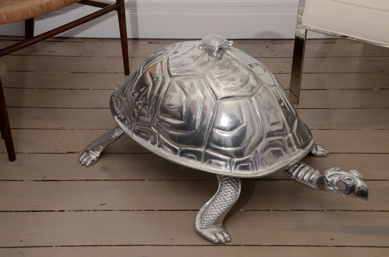 Beautifully rendered sand cast aluminum turtle with baby turtle sitting atop of this dual sculpture and serving container with  wood cutting/serving board and serving utensils!
